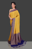 Antique zari work khaddi banarasi handloom saree in golden yellow color