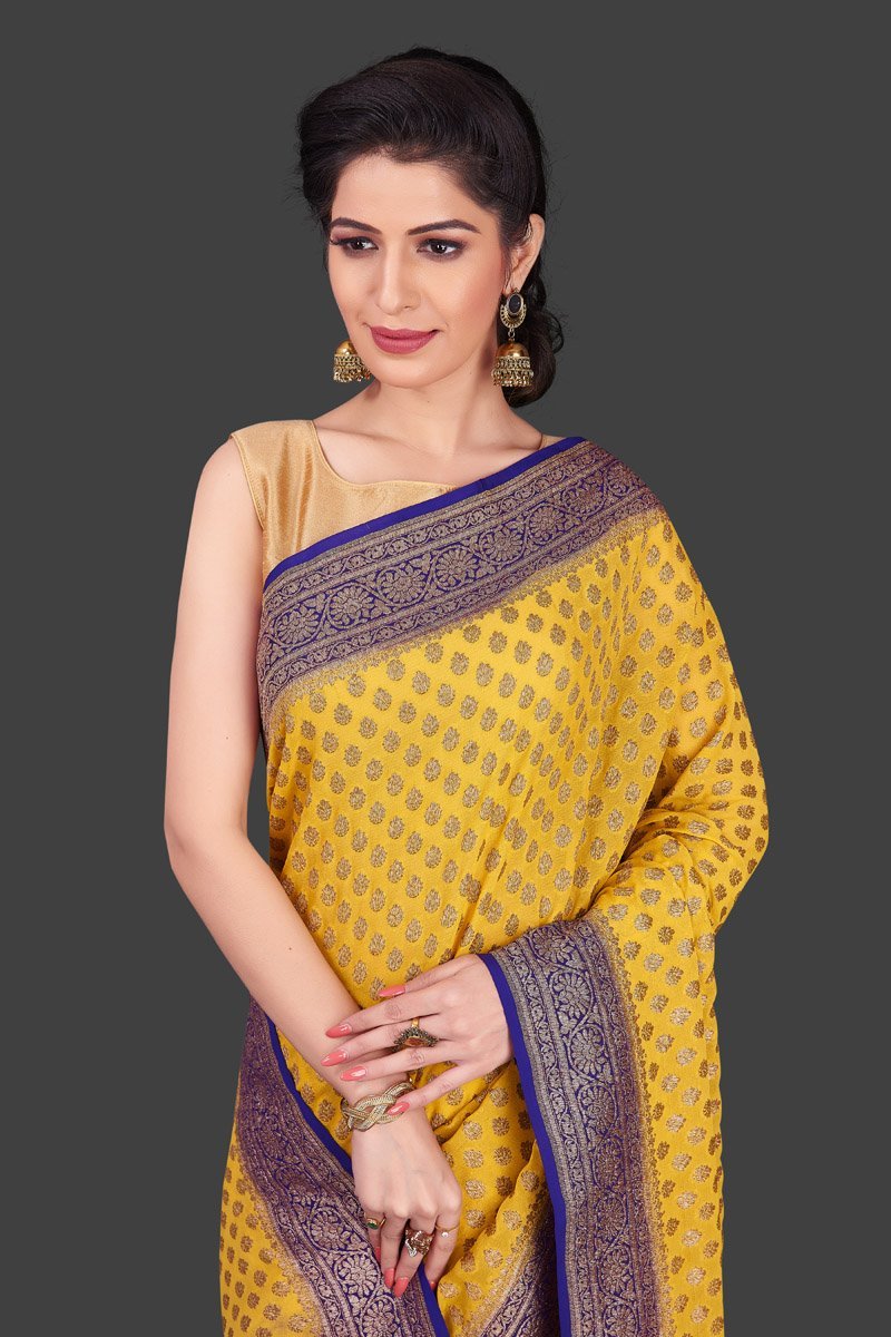 Khaddi handloom banarasi antique zari saree in golden yellow color