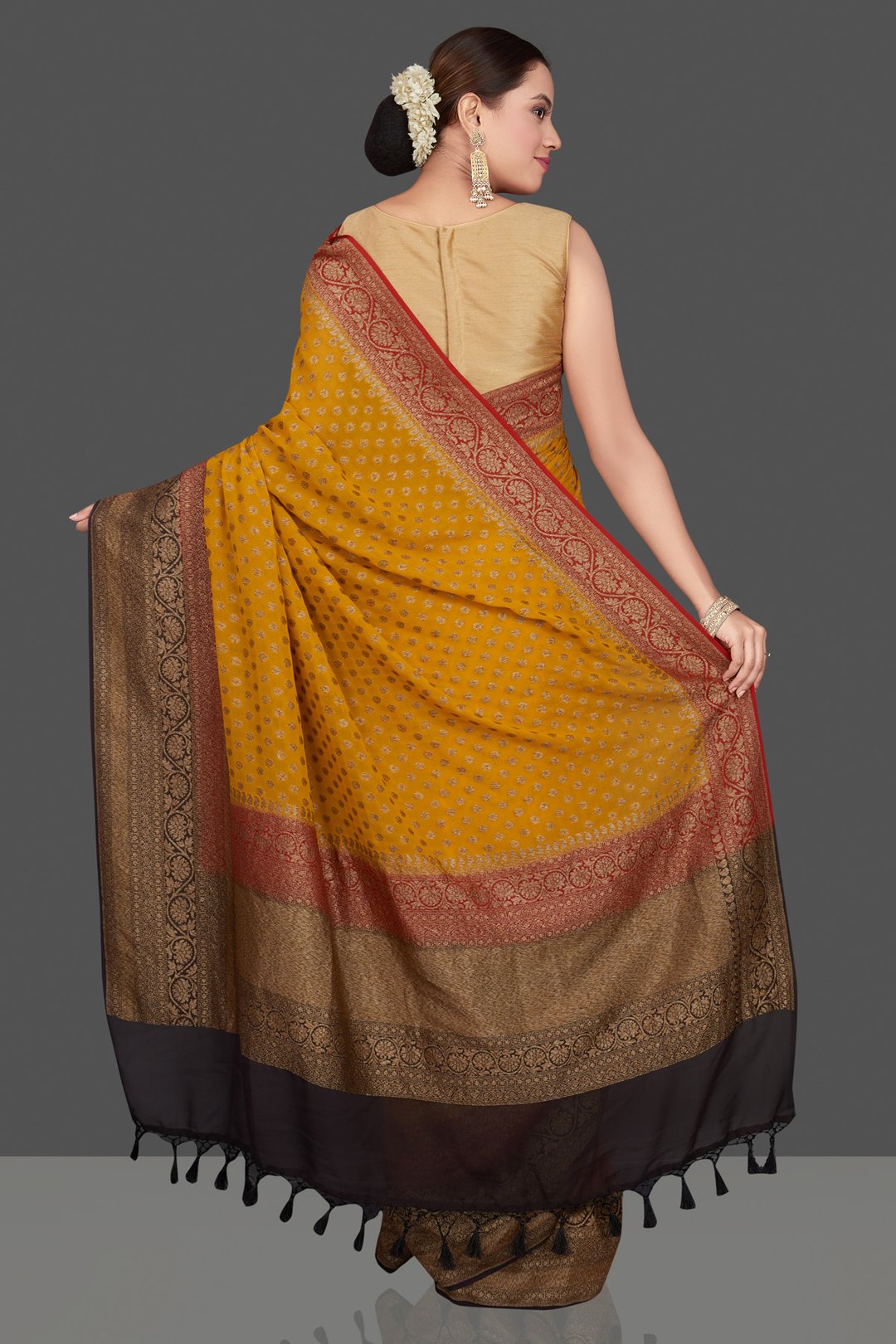 Georgette banarasi handloom antique zari work saree in golden color