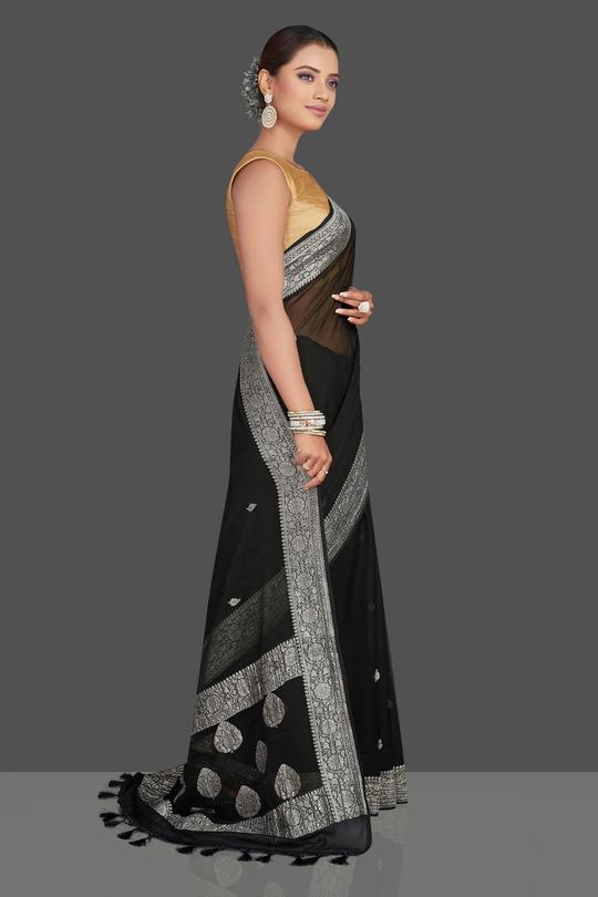 Chiffon silk saree in black color with silver zari