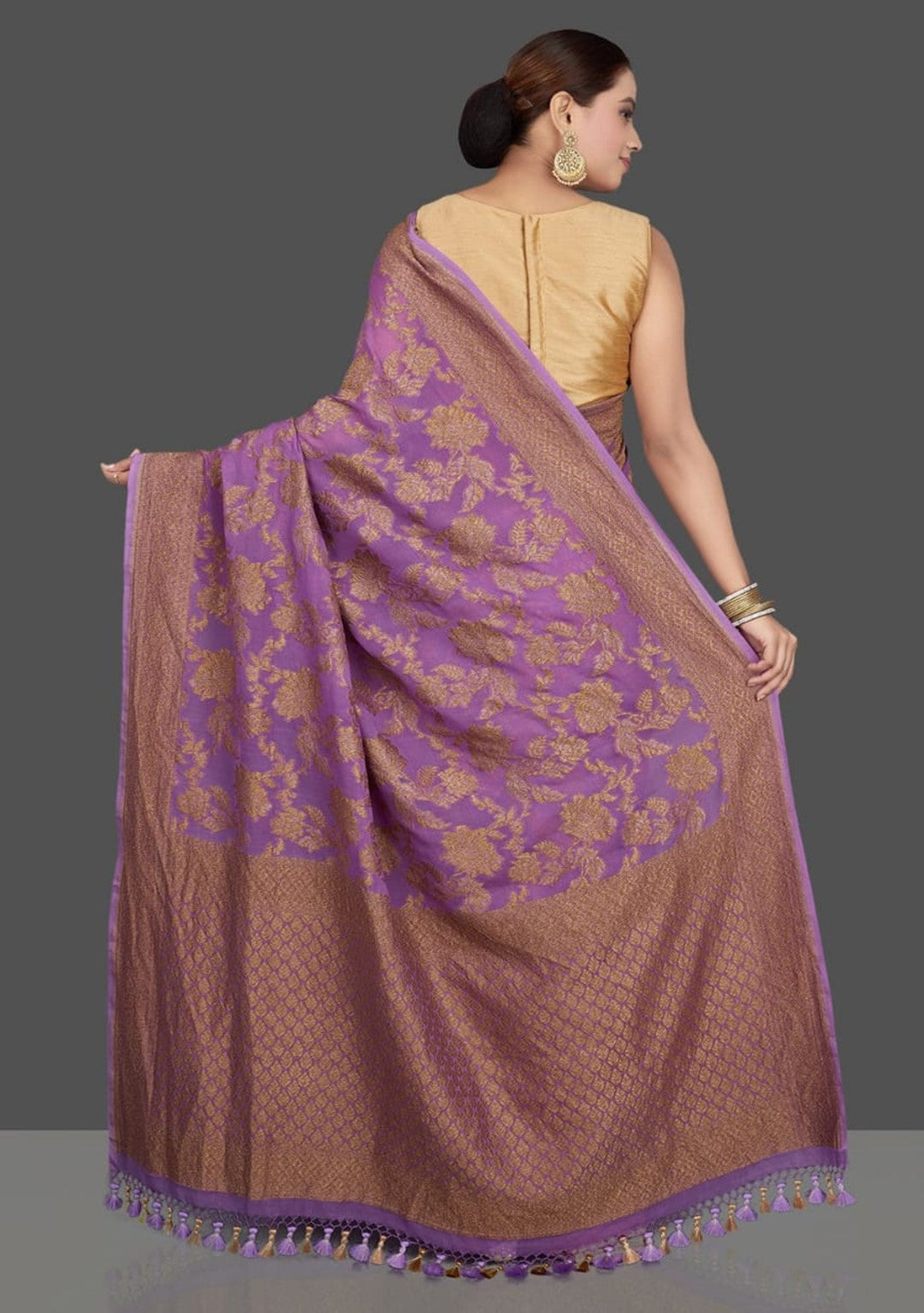 Handloom georgette banarasi saree in purple color with antique zari work