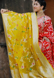 A stunning Yellow Banarasi dupatta. The authentic Meenakari jaal work with golden zari handwoven in the finest chiffon georgettes. It takes around 4-5 days to weave this rich and luxurious piece of our tradition.  Color - An enchanting Yellow color. Fabric - Pure Khaddi Chiffon Georgette. Length - 2.5 mtr.  Width - 45 inches . Care - Dry clean. Note - Slight irregularities can be there as its a handwoven product.