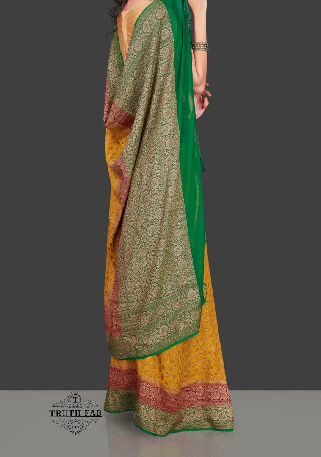 Georgette banarasi handloom saree in yellow color with antique zari work