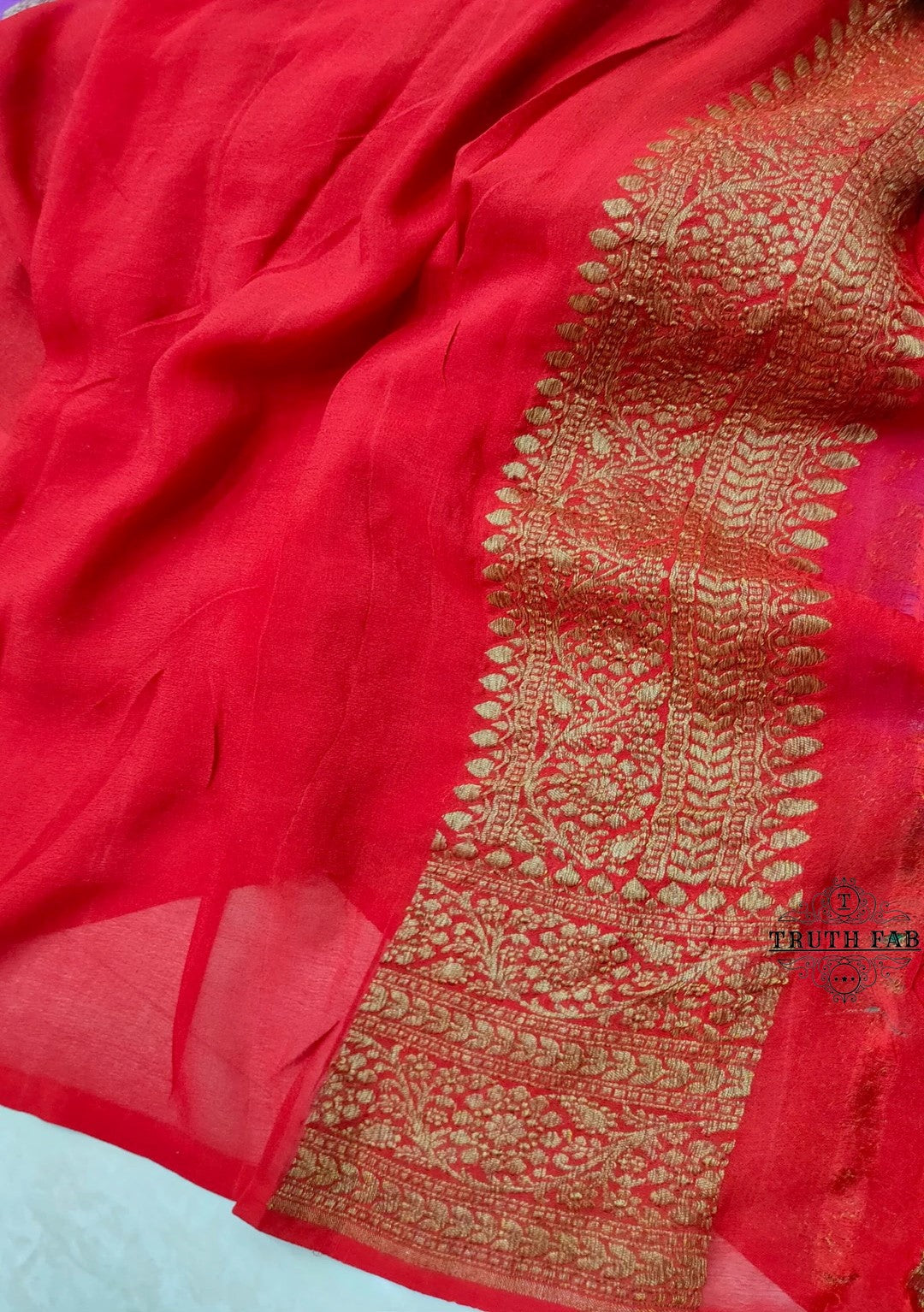 Antique zari work magenta color georgette banarasi saree