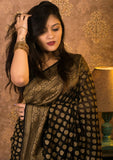 Handloom georgette saree with antique zari in black color