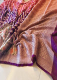 Pure handloom chiffon meenakari saree with neem zari design in purple color. Saree has a delicate chiffon meenakari zari border with Gorgeous unique Motifs near pallu. The entire saree is beautiful with neem zari design. It is an elegant traditional Banarasi saree. Irresistible wedding collection. This Mesmerising Saree is a Combination of Elegance and Style.