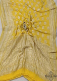 Water zari work khaddi banarasi saree in turmeric yellow color