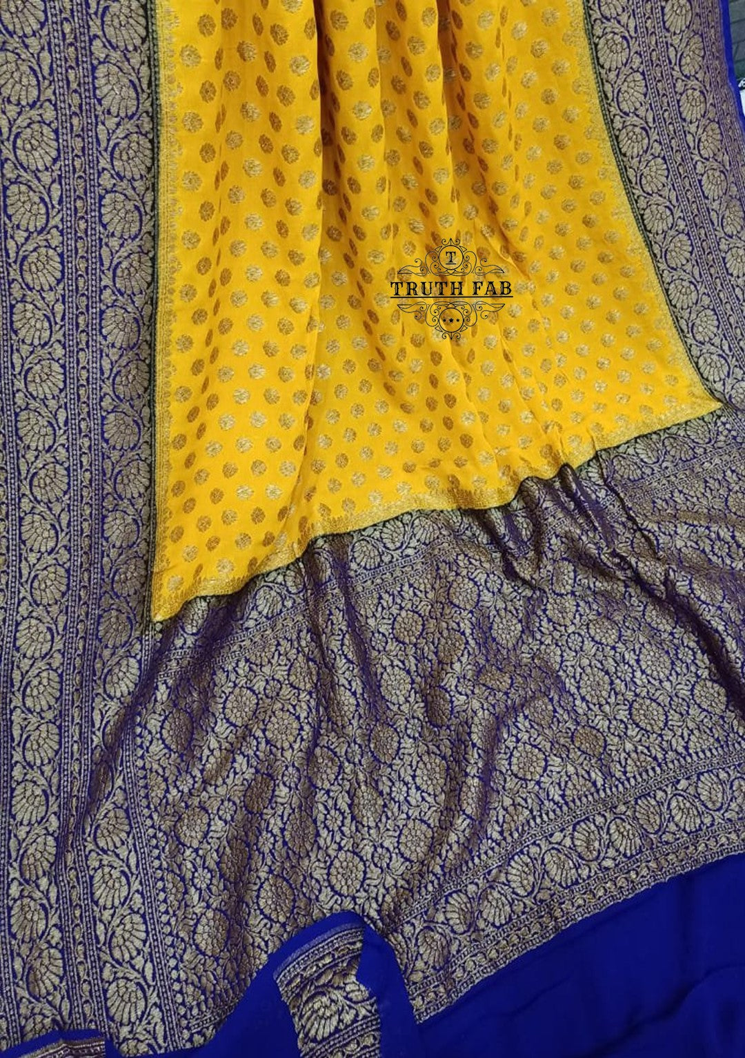 Antique zari work georgette banarasi handloom saree in yellow color